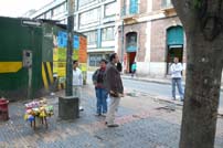 '...a common practice on the streets of Bogota is that people rent out their cell phones on street corners and charge by the minute (to the man in the suit, the 2 women & I think the guy in the background acts as watchdog). Not a great image but I had to shoot quickly as I could tell the women were nervous with me and my camera.'